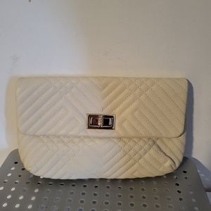 NWOT cute crossbody or shoulder bag. THIS IS NOT LEATHER. Cream/White